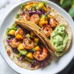 Spicy Shrimp Tacos with Mango Slaw and Avocado Crema